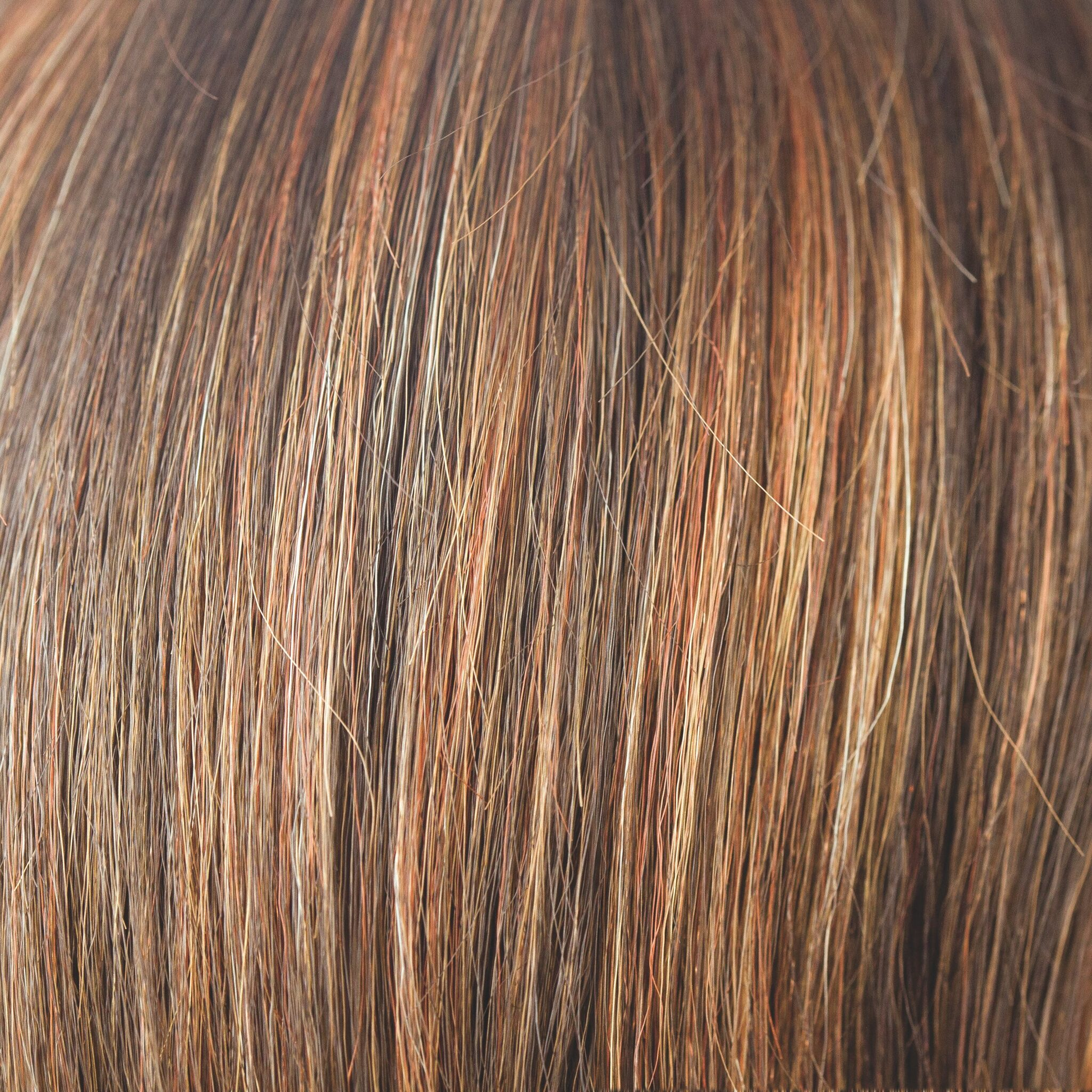 Dark Rust  -  A medium to light multi-tonal red with highlights and lowlights of rusty red shades and apricot bronze with tastefully placed slices of Tuscan terracotta.