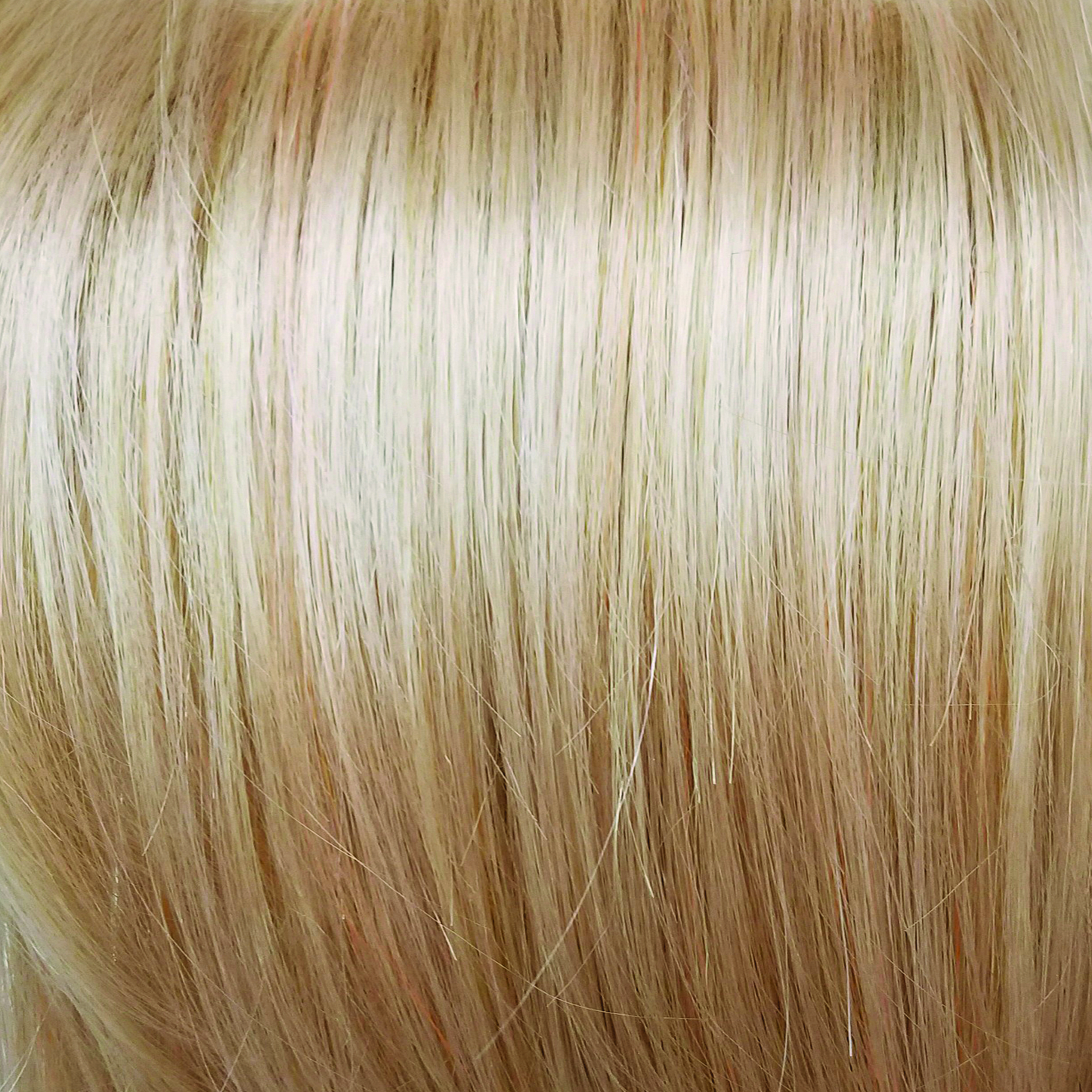 Peach Gold  -  At first glance, this looks like a brilliant medium brown rooted blond, then it pops like a concerto of colored sunbeams with the palest of peaches, limes and lilac pinks. Pastel Rainbow-R is full of surprises.