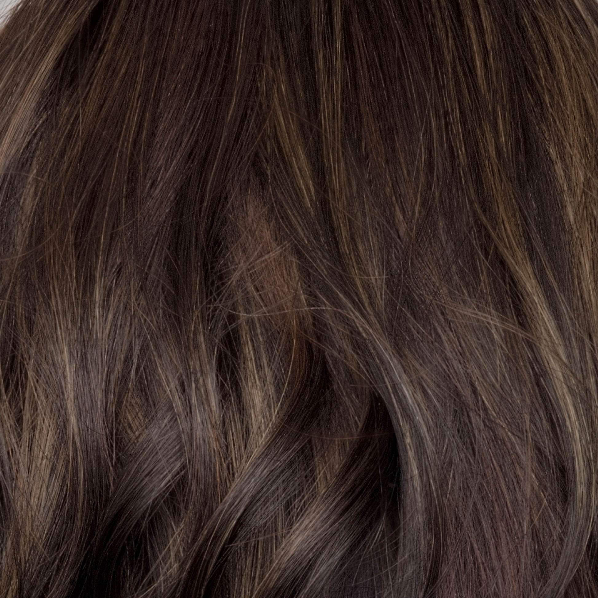 Spiced Mocha-R  -  A dark-brown base with perfectly placed warm-medium brown and medium reddish-brown highlights. The root tone adds a natural shadowed effect.