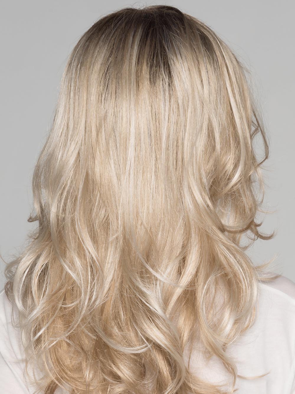 This wig features a mono crown to create the appearance of a natural hair growth pattern and a micro lace front for a more natural look