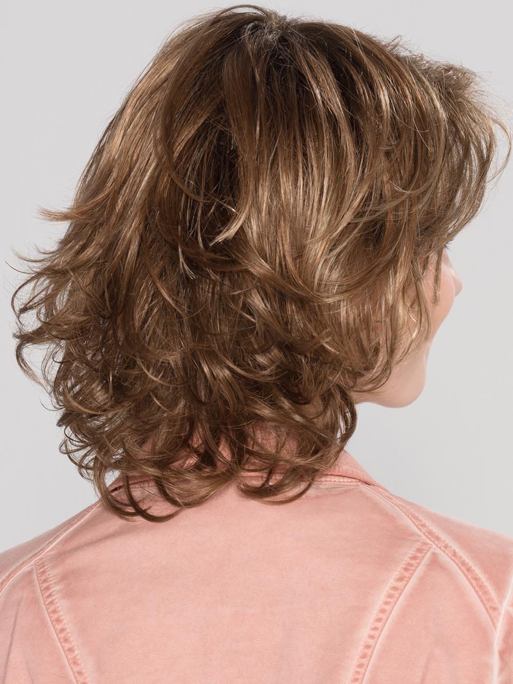 There's a mono crown allowing the hair to fall naturally and a lace front which allows you the option wear off your face presenting a natural hairline