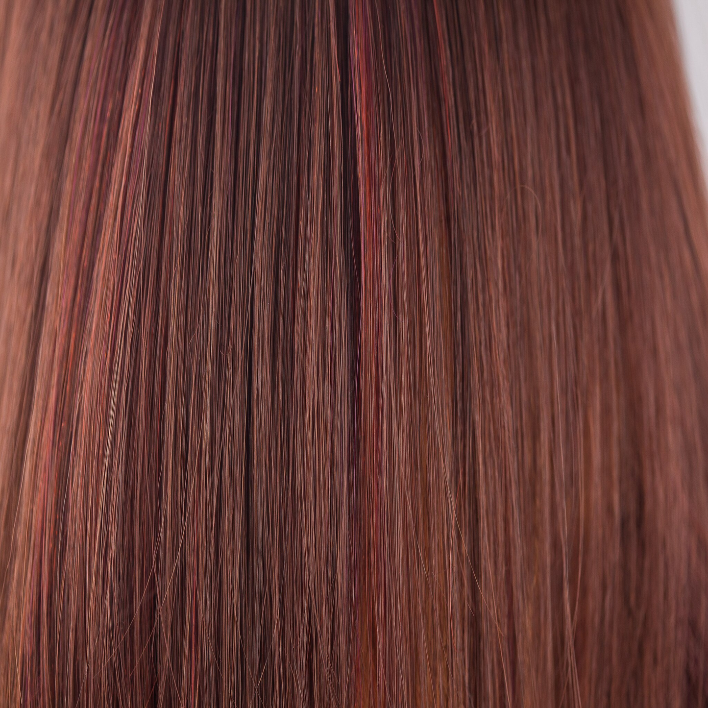 Cherrywood  -  A hybrant underlighted medium red brown mix has a multitude of tiny chocolate and rich cherry tones and fine flashes of ruby scarlet. Beautiful and delicately textured bringing out all the definition and shine of the style.