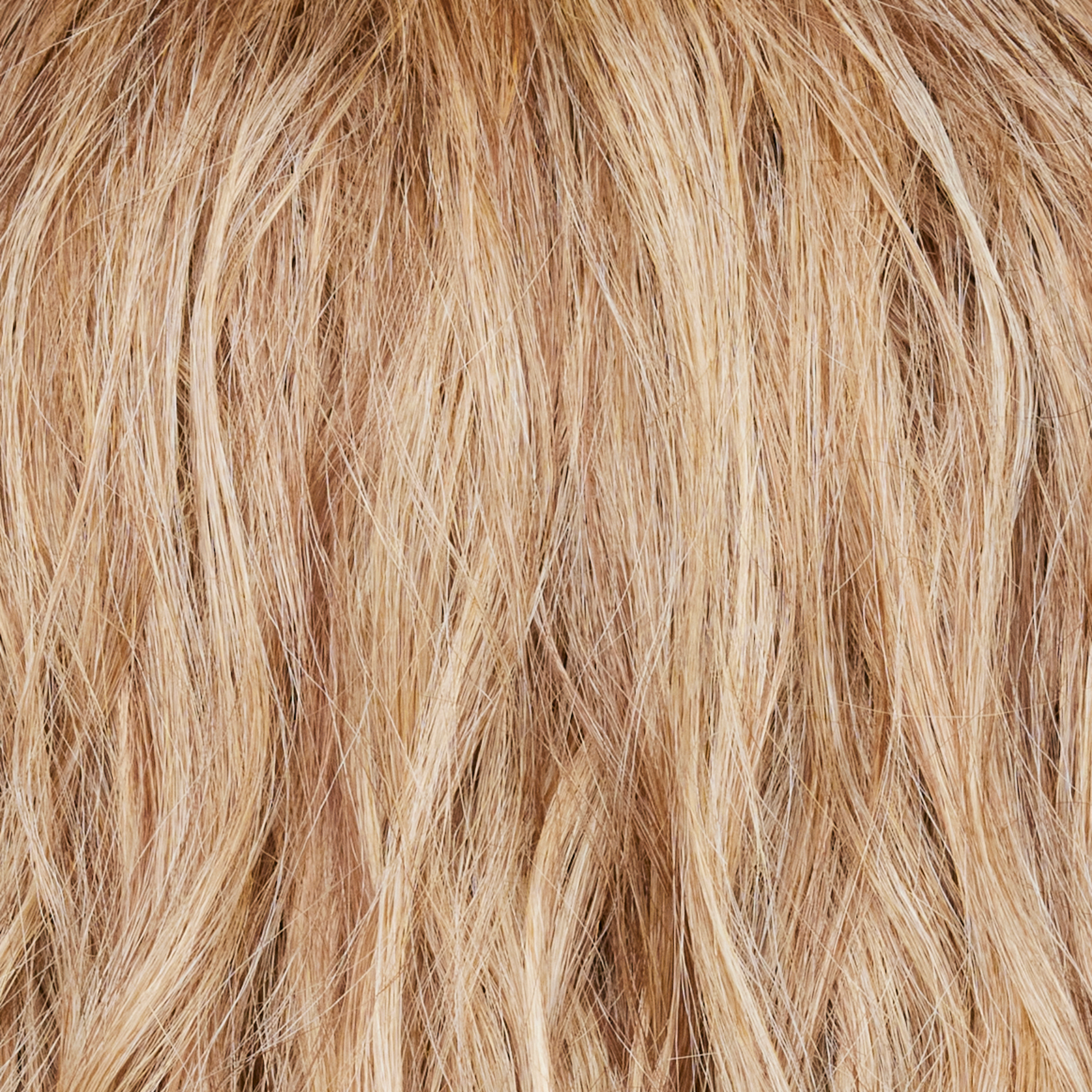 Cinder Toffee  -  A beautiful blended blond, that boasted an array of toffee, burnt toffee, fudge blond, milk chocolate, and deep golden blond tones. Cinder Toffee is a very flattering color and suits all skin tones.