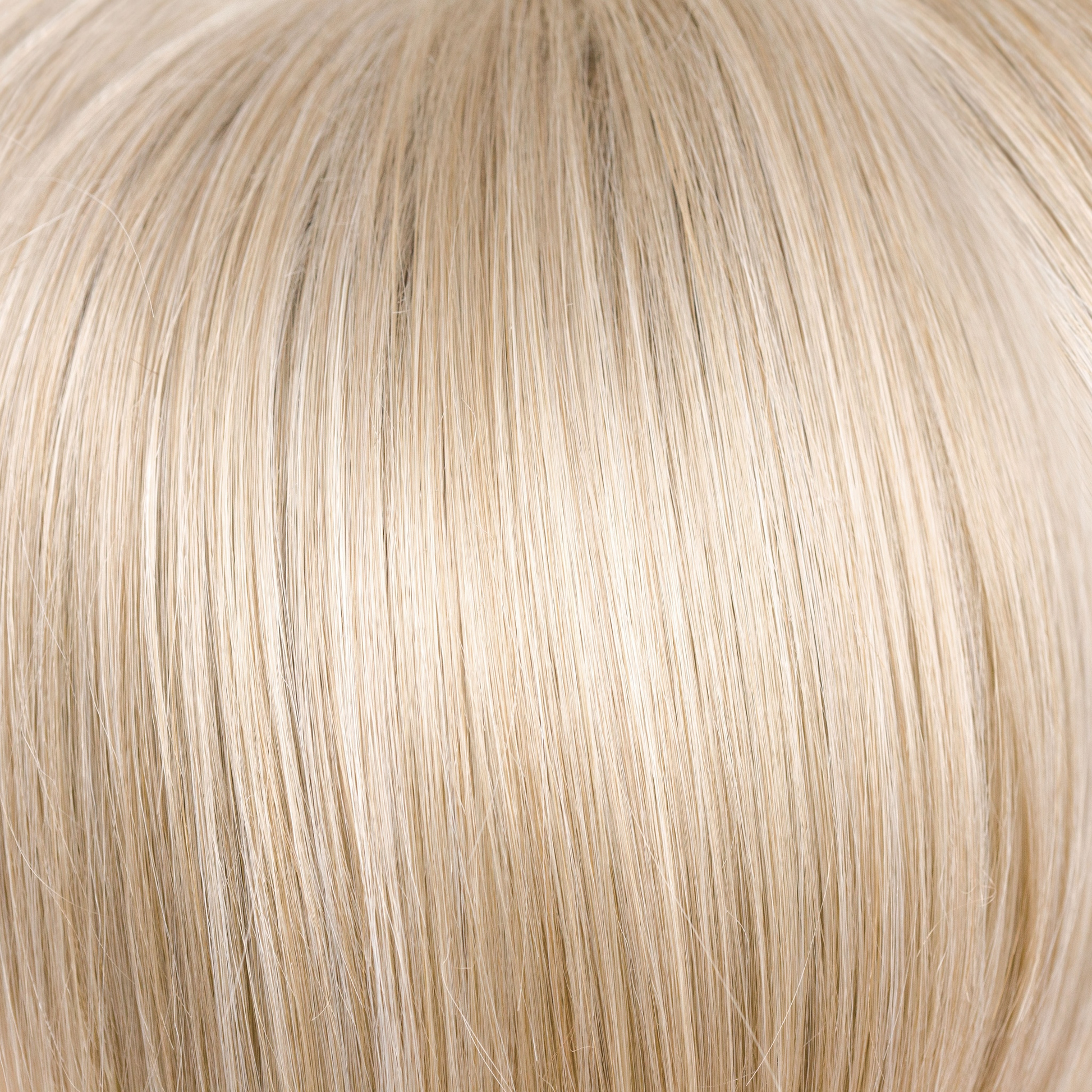 Creamy Blond  -  This bombshell blond is packed with platinum blond and creamy highlights. The lightest of our traditional blonds. Though it is very light, it is still able to flatter the skin tone with its unique blended formula.