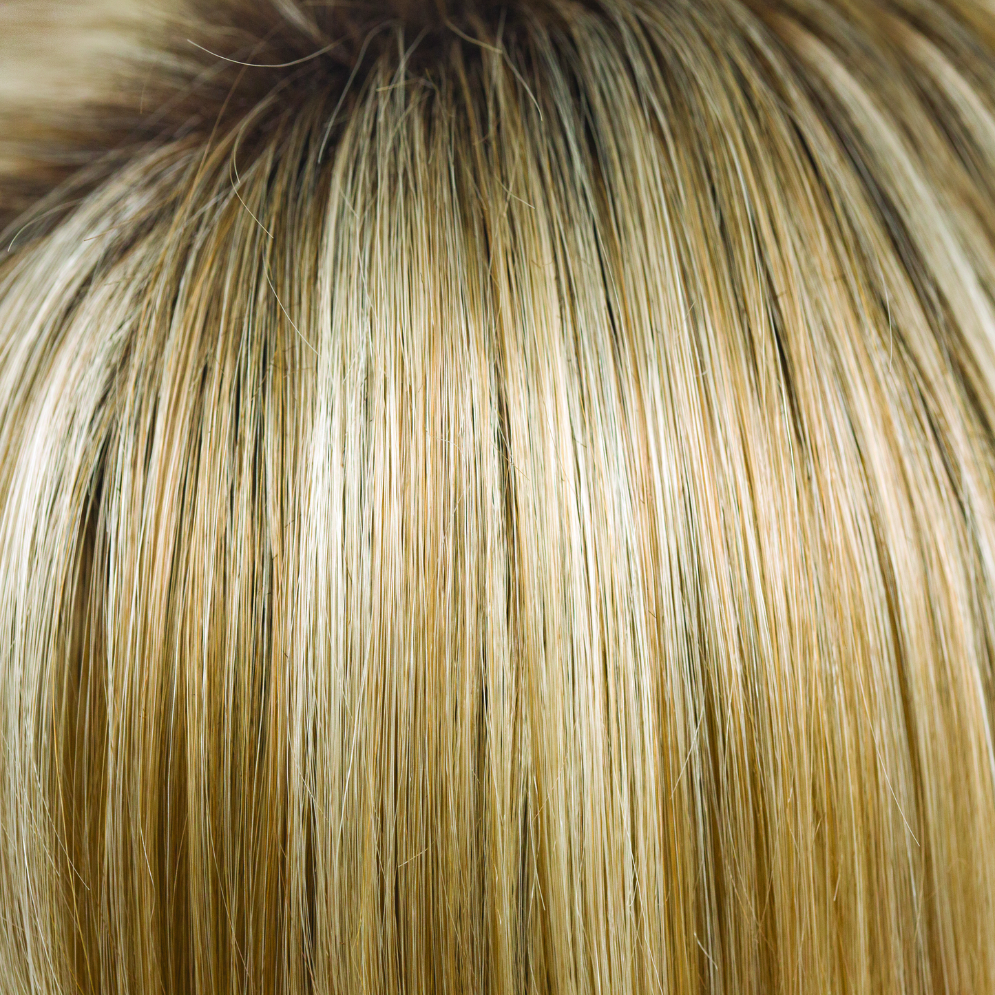 Creamy Toffee-LR  -  An ombre version of Creamy Toffee R, it is a rich medium brown chocolate stretched root, blended into cool, gold honey tones and cream blond with a toffee twist. This is very fashion forward working great both with longer styles and mid length cuts.