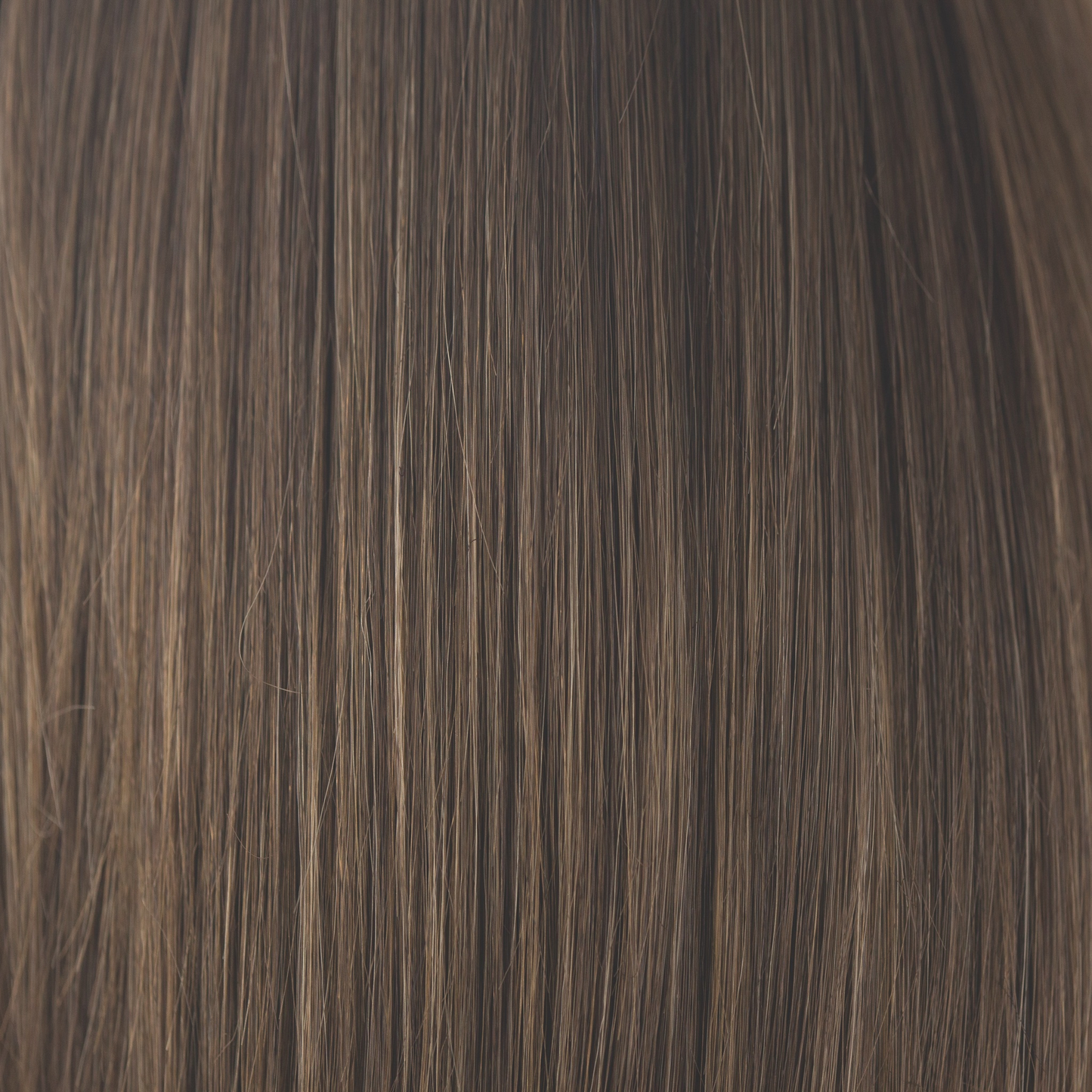 Medium Brown  -  This cool-toned medium brown is a perfect fusion for both brown and blond enthusiasts. Medium Brown is a beautiful blend of both worlds - an ageless classic.