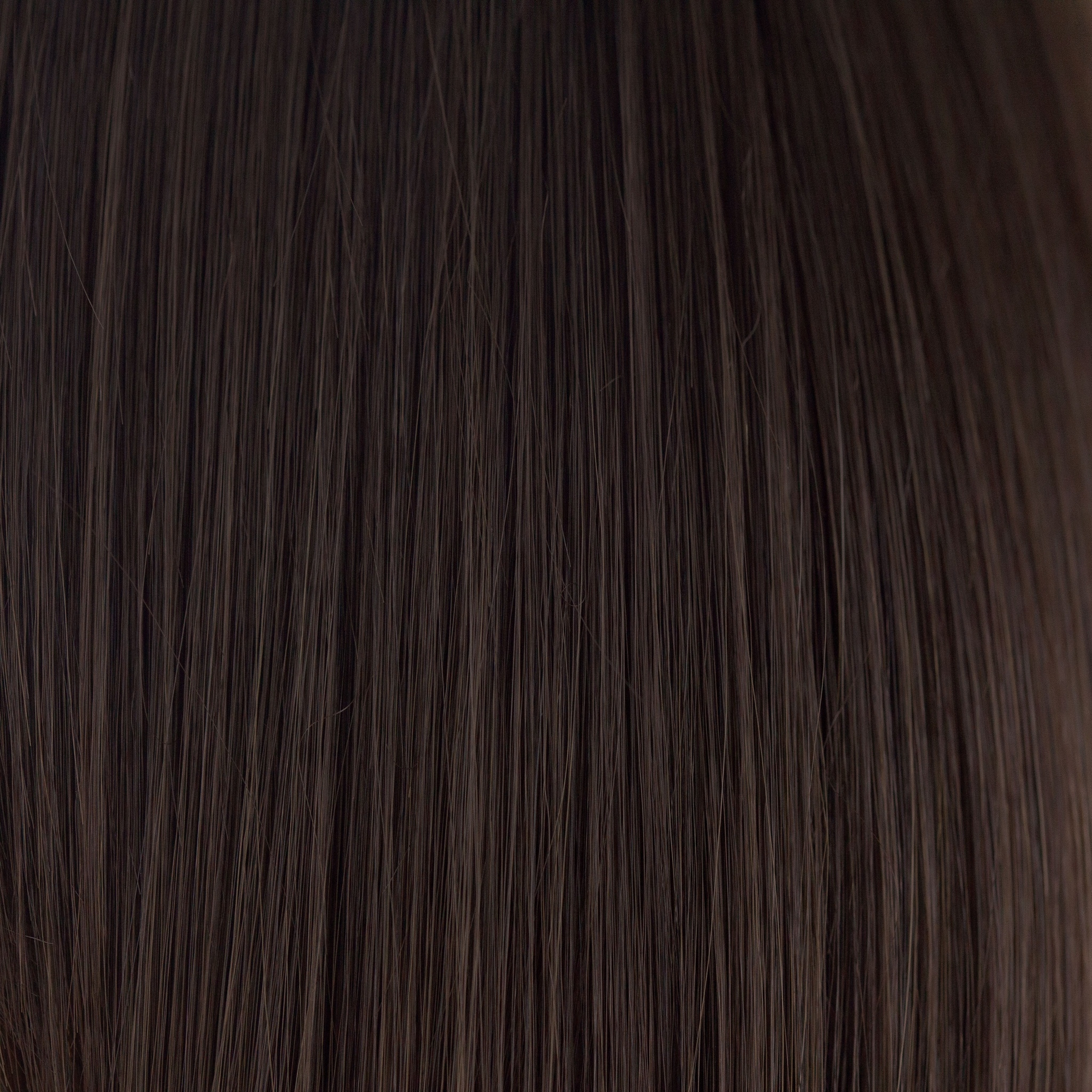 NM Cappucino  -  A deep, pure brown blended with a warm, rich mahogany brown. It has a realistically smooth "go to" in its essential tone.