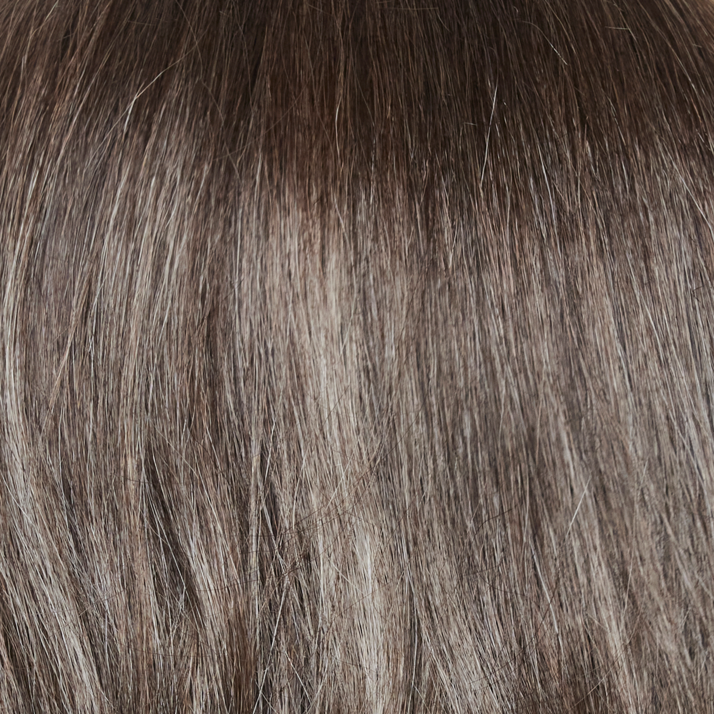 NM Truffle Brown-LR  -  A long rooted neutral medium-brown tone, softly blended with light ash blond. The long root creates a very subtle ombre effect.